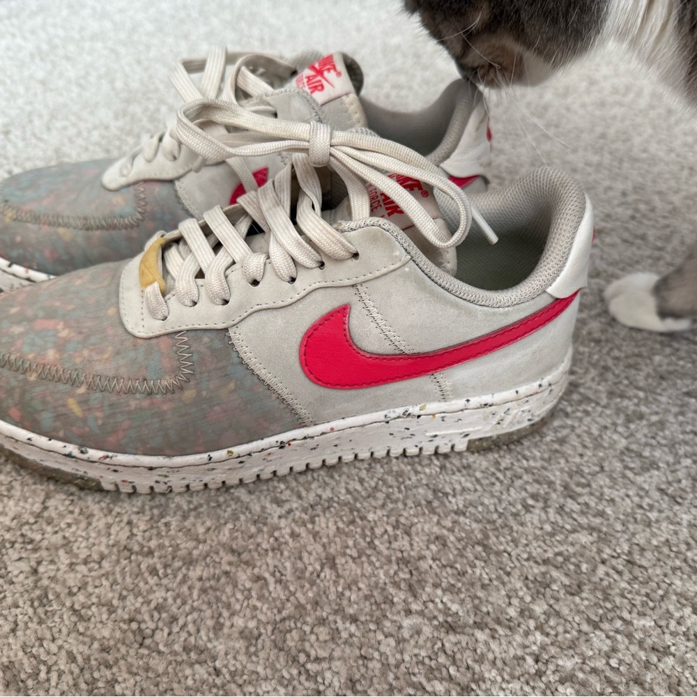 Nike Sneakers with Bright Pink Swoosh